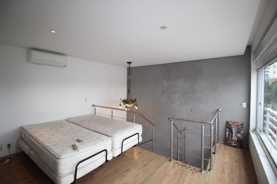 Suíte 1 de apartamento para alugar com 1 quarto, 93m² em Auxiliadora, Porto Alegre