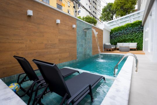 Área externa de casa para alugar com 3 quartos, 175m² em Embaré, Santos