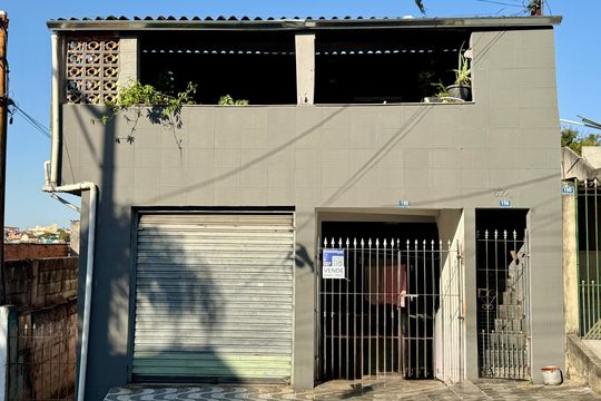 Fachada de casa à venda com 3 quartos, 120m² em Jardim dos Afonsos, Guarulhos