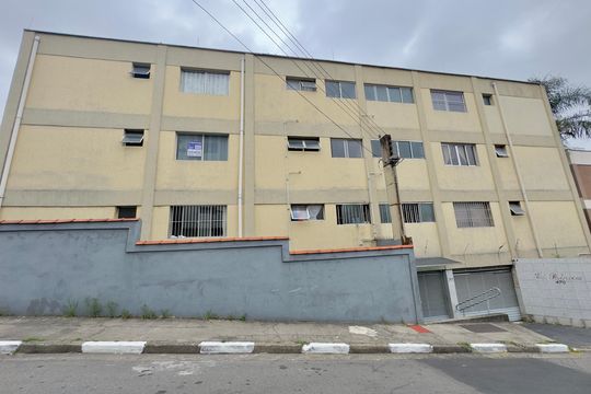 Placa instalada na fachada do imóvel de apartamento à venda com 2 quartos, 102m² em Macedo, Guarulhos