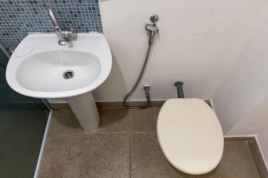 Banheiro de apartamento para alugar com 1 quarto, 47m² em Aparecida, Santos