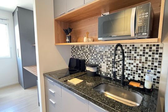 Cozinha de apartamento para alugar com 1 quarto, 15m² em Ferreira, São Paulo