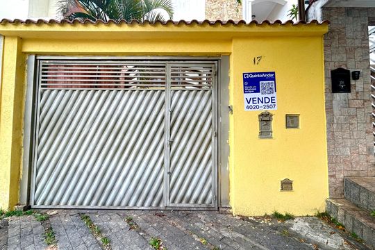 Placa instalada na fachada do imóvel  de casa à venda com 3 quartos, 250m² em Parque Continental Ii, Guarulhos