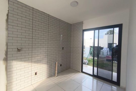 Cozinha de casa de condomínio para alugar com 2 quartos, 46m² em Viamópolis, Viamão