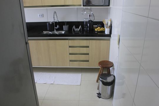 Cozinha com área de serviço de apartamento à venda com 2 quartos, 62m² em Vila Barros, Guarulhos