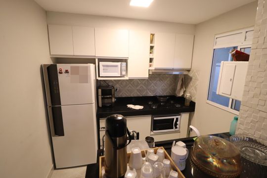 Cozinha de apartamento para alugar com 2 quartos, 65m² em Jardim Holanda, Uberlândia
