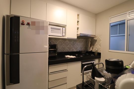 Cozinha de apartamento para alugar com 2 quartos, 65m² em Jardim Holanda, Uberlândia