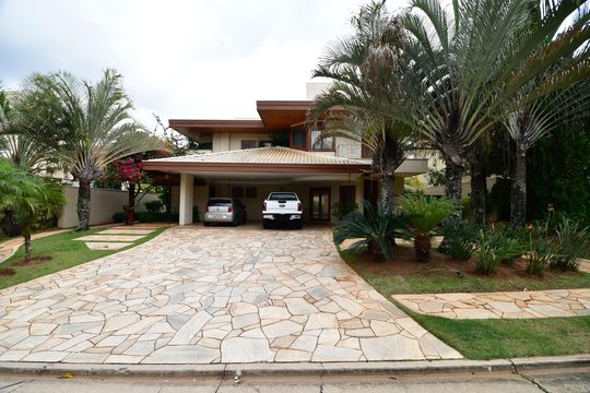 Fachada de casa de condomínio para alugar com 4 quartos, 470m² em Loteamento Alphaville Campinas, Campinas