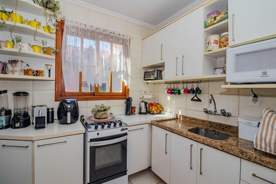 Cozinha de casa à venda com 3 quartos, 114m² em Morro Santana, Porto Alegre