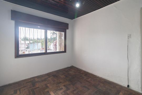 Quarto 1 de casa para alugar com 2 quartos, 60m² em Campo Novo, Porto Alegre