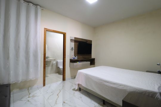 Quarto 1 - Suíte de casa para alugar com 2 quartos, 286m² em Jardim Holanda, Uberlândia