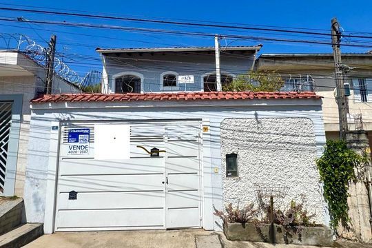 Placa instalada na fachada do imóvel  de casa à venda com 3 quartos, 168m² em Jardim Rosa de Franca, Guarulhos