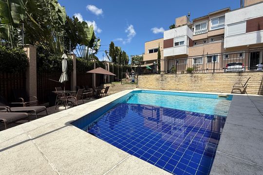 Área externa de casa de condomínio à venda com 3 quartos, 214m² em Morro Santana, Porto Alegre