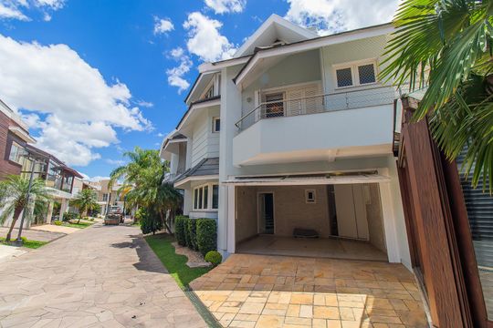 Fachada de casa de condomínio à venda com 4 quartos, 208m² em Sarandi, Porto Alegre