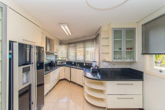 Cozinha de casa de condomínio à venda com 4 quartos, 208m² em Sarandi, Porto Alegre