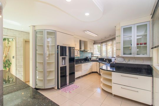 Cozinha de casa de condomínio à venda com 4 quartos, 208m² em Sarandi, Porto Alegre