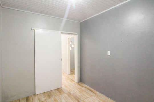 Quarto 1 de casa para alugar com 2 quartos, 130m² em Harmonia, Canoas