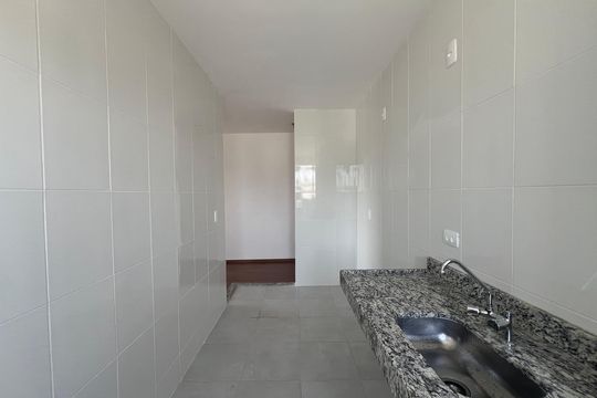 Cozinha de apartamento para alugar com 2 quartos, 49m² em Braúnas, Belo Horizonte
