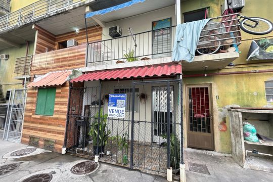 Fachada + placa de apartamento à venda com 3 quartos, 60m² em Bonsucesso, Rio de Janeiro
