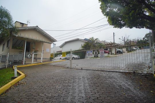 Fachada de casa de condomínio à venda com 2 quartos, 76m² em Rincão, Novo Hamburgo