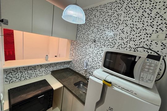 Cozinha de apartamento à venda com 1 quarto, 40m² em Jardim Paulista, São Paulo