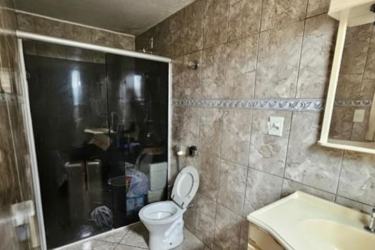 Banheiro de casa à venda com 4 quartos, 396m² em Novo das Indústrias, Belo Horizonte