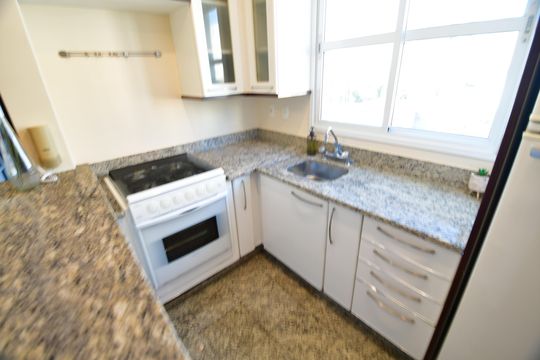 Cozinha de apartamento para alugar com 2 quartos, 76m² em Cambuí, Campinas