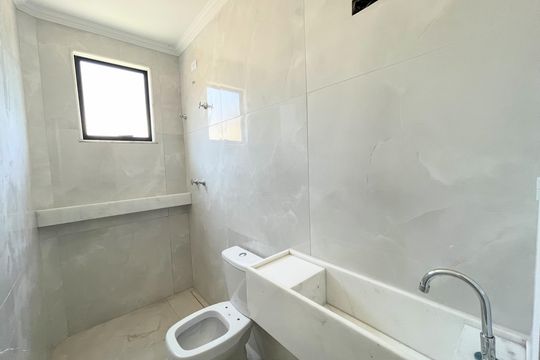 Banheiro de casa à venda com 3 quartos, 120m² em Itapoã, Belo Horizonte