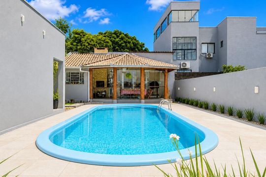 Área externa de casa para alugar com 2 quartos, 65m² em Tarumã, Viamão