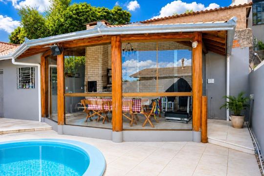 Área externa de casa para alugar com 2 quartos, 65m² em Tarumã, Viamão