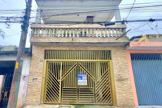 Placa instalada na fachada do imóvel  de casa para alugar com 2 quartos, 115m² em Jardim dos Pimentas, Guarulhos