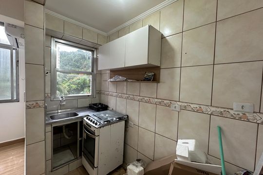 Cozinha de apartamento para alugar com 1 quarto, 50m² em Centro, São Vicente