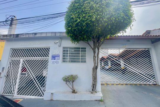 Placa instalada na fachada do imóvel  de apartamento à venda com 2 quartos, 65m² em Vila Harmonia, Guarulhos