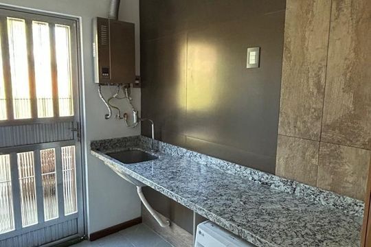 Área de serviço de casa à venda com 3 quartos, 320m² em Niterói, Canoas