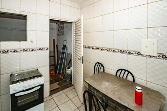 Cozinha de casa de condomínio à venda com 2 quartos, 44m² em Planalto, Belo Horizonte