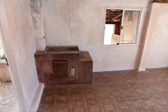 Área de serviço com fogão a lenha de casa para alugar com 2 quartos, 133m² em Jardim Pacaembu, Jundiaí