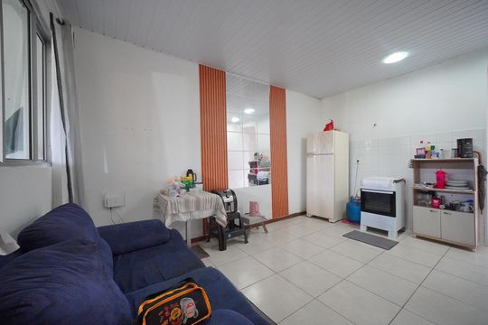 Sala  de casa de condomínio para alugar com 2 quartos, 59m² em Forquilhas, São José
