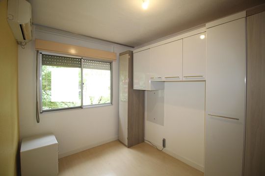Quarto 1 de apartamento para alugar com 1 quarto, 45m² em Jardim Itu, Porto Alegre