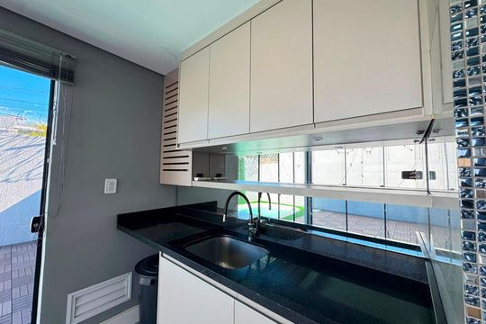 Área de serviço de casa de condomínio para alugar com 3 quartos, 100m² em Distrito Industrial, Cachoeirinha