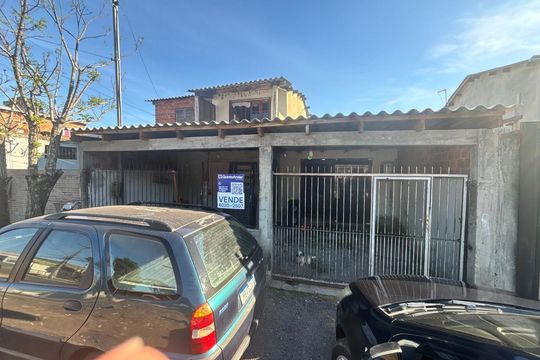 Placa instalada em 17/09/2026 com o código QLYB-99 de casa à venda com 3 quartos, 69m² em Santo Afonso, Novo Hamburgo