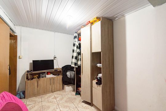 Quarto 1 de casa para alugar com 2 quartos, 90m² em Guajuviras, Canoas