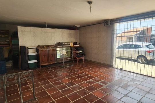 Garagem de casa à venda com 3 quartos, 252m² em Vila Lemos, Campinas