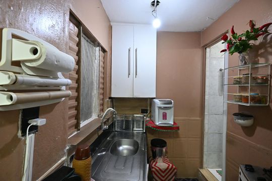 Cozinha de casa à venda com 2 quartos, 60m² em Paraisópolis, São Paulo