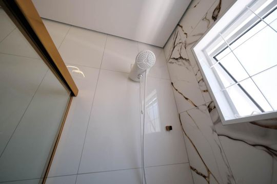 Banheiro de casa à venda com 3 quartos, 120m² em Parque Boturussu, São Paulo