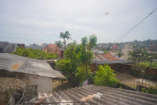 Vista da Rua de casa à venda com 3 quartos, 55m² em Chácara das Pedras, Porto Alegre