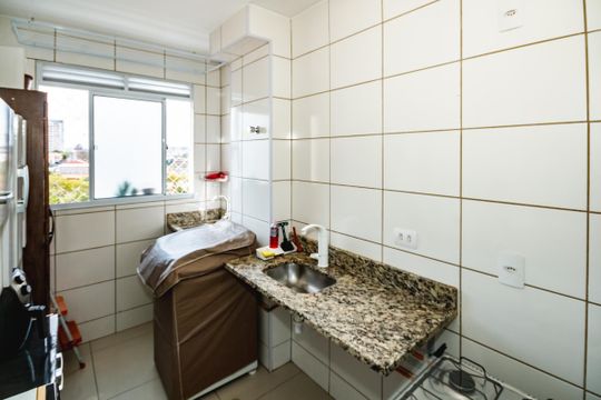 Cozinha e Área de Serviço de apartamento à venda com 2 quartos, 48m² em Planalto, Belo Horizonte