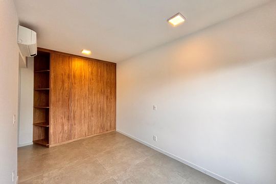 Suíte 1 de apartamento para alugar com 2 quartos, 90m² em Alphaville Industrial, Barueri