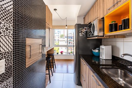 Cozinha de apartamento para alugar com 2 quartos, 72m² em Independência, Porto Alegre