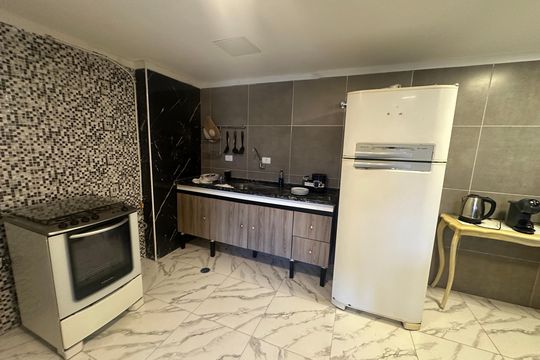 Cozinha de apartamento para alugar com 2 quartos, 82m² em Ilha Porchat, São Vicente