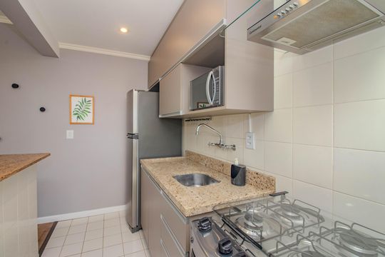 Cozinha e Área de Serviço de apartamento para alugar com 1 quarto, 49m² em Auxiliadora, Porto Alegre